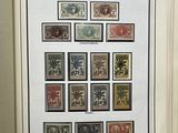 an open book with a picture of a number of stamps on it