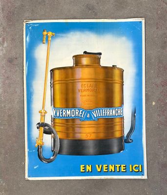 a poster of a beer keg on the wall