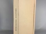 the book is open and sitting on a table