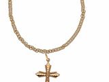 un collier en or avec un pendentif en forme de croix au bout d'une chaîne