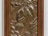 une plaque en bronze représentant un homme muni d'une épée et d'un oiseau