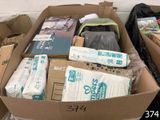 a box full of toilet paper and other items in it