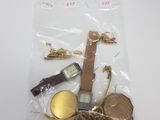 a lot of items that are in a bag on the table