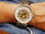 a close up of a person ' s wrist with a watch on it