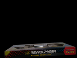 a box with a skateboard inside of it on a black background