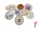 a lot of plates that are sitting on a table