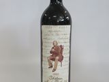 a bottle of wine that is sitting on a table