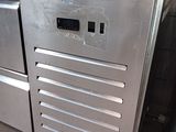 a stainless steel kitchen with a microwave and a dishwasher in it
