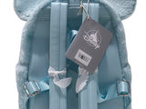 a blue backpack with ears and a tag attached to it