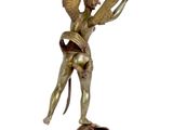 bronze figurine of a woman holding a bird on a marble base