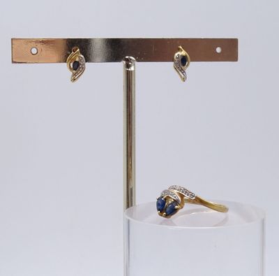 a ring and a ring holder on a glass stand