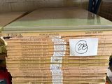 a stack of boxes on a pallet in a warehouse