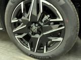 a close up view of a tire on a car