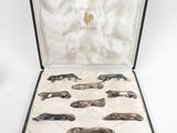 a case that has a bunch of silver spoons in it