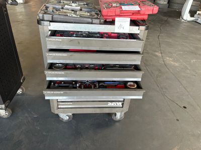a cart with tools on it in a warehouse
