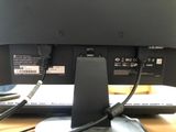 an image of a computer monitor and keyboard on a desk