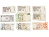 many different types of currency that are on display