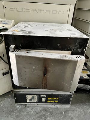 an image of a microwave oven sitting on top of a counter