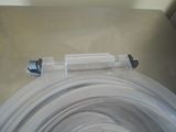 an image of a plastic tub with a hose attached to it