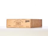 a wooden box that has a wine bottle in it