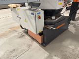 a picture of a machine that is sitting on the ground