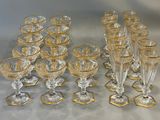 a lot of glasses that are sitting on a table