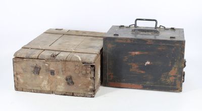 two old suitcases sitting next to each other on a white surface