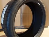 a close up of a tire sitting on a cardboard box