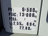 a picture of a gas pump with a sign on it