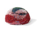 the beaded hat is red, white, and blue