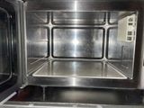 an image of a stainless steel oven with its door open