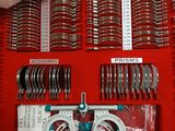 a red box with a bunch of different types of tools in it