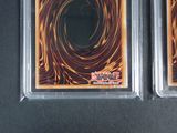 an image of two cards with a black hole in the middle