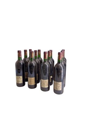 six bottles of wine sitting next to each other on a white surface