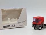 a toy truck that is sitting in front of a box