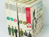 les livres sont empilés sur une surface blanche