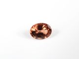 un diamant marron sur fond blanc