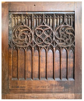 an old wooden panel with a star design on the top of it