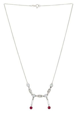 a close up of a necklace on a white background