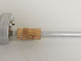 a close up of a toothbrush with a cork on it