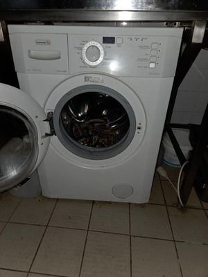 an image of a washer and dryer in a bathroom