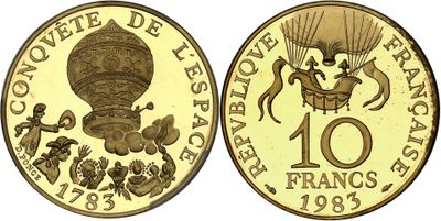 a close up of a coin with an image of a hot air balloon