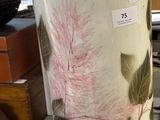 a vase that has a bunch of umbrellas in it