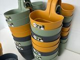 many cups that are sitting on a table