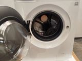 a washing machine that is sitting on a pallet