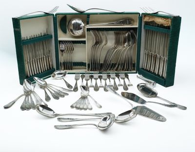 many spoons and forks in a green case