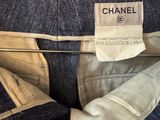 chanel denim pants with a label on the back of the pants