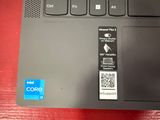 a close up of a laptop with a qr code on the keyboard