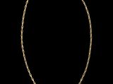 un collier en or dont la chaîne est mise en valeur sur un fond noir