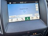 a picture of a car dashboard with a touch screen